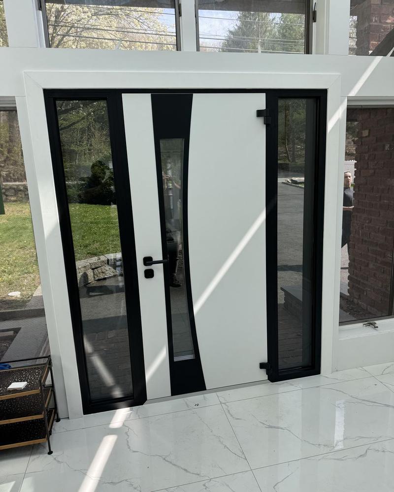 The same curved-glass entry door seen from the front hall